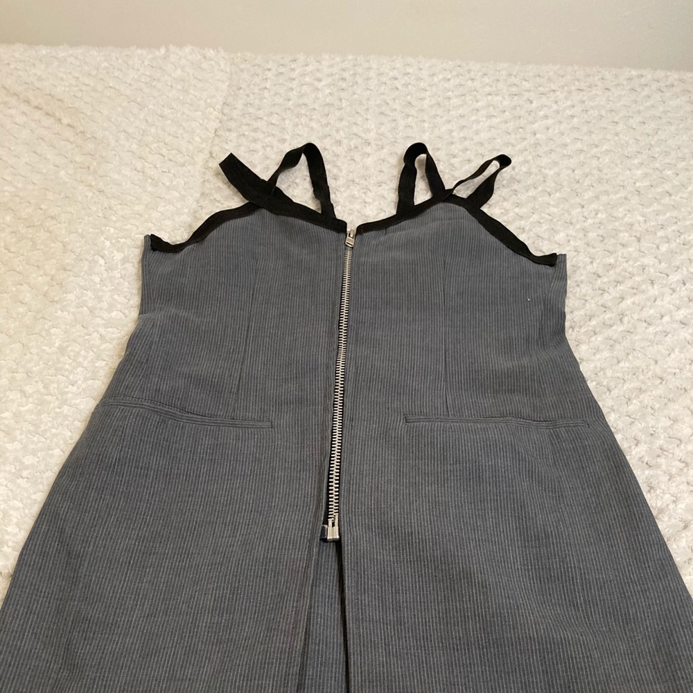 Corseted best with black spaghetti strap